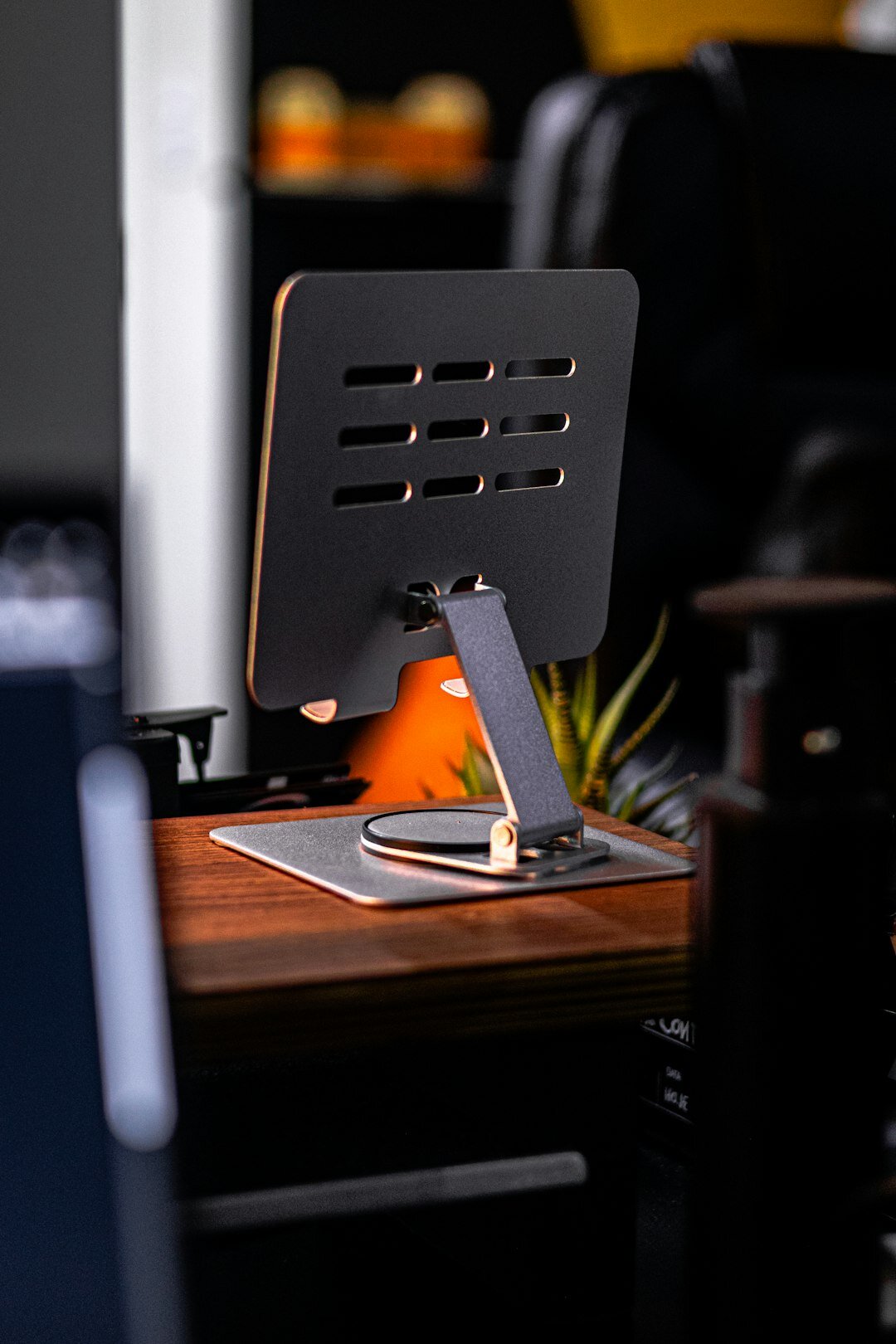 Friendly customer support desk with headset and laptop in a bright office